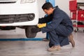 Changing a tire at an auto shop Royalty Free Stock Photo