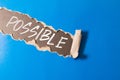 Changing the word impossible to possible with a eraser