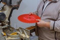 Changing worker saw blade of the main replaceable elements of a woodworking Royalty Free Stock Photo