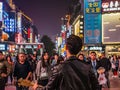 Unacquainted street performers singing at huangxing walking street in Changsha city China