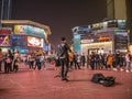 Unacquainted street performers singing at huangxing walking street in Changsha city China