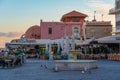 Chania, Greece, August 23, 2022: Sunrise view of a tourist stree Royalty Free Stock Photo