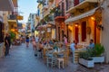 Chania, Greece, August 21, 2022: Sunset view of a tourist street