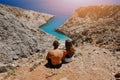 Young couple staring at the beach