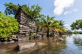 A channel and town walls in Nan Madol - prehistoric ruined stone city. Pohnpei, Micronesia, Oceania. Royalty Free Stock Photo