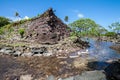 A channel and town walls in Nan Madol - prehistoric ruined stone city. Pohnpei, Micronesia, Oceania. Royalty Free Stock Photo