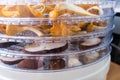 Chanterelles and porcini mushrooms in the dehydrator