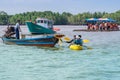 CHANTHABURI, THAILAND: APRIL 15, 2019 Unidentified tourists relax on rafts and kayaking on the sea on april 15,2019 at Bang Chan