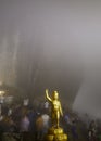 Foggy night People are worshiping the footprint in the rock on the top of Kitchakut Mountain Royalty Free Stock Photo