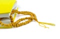 Chanting book and wooden rosary Royalty Free Stock Photo