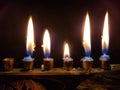 Chanukah Candles in a Modern Metal Menorah