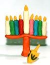 Chanukia from plasticine of different colors. Hanukkah. Hebrew Dreidel. Sevivon. Jewish holiday Royalty Free Stock Photo