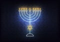 Chanukkah Menorah neon sign. Glowing decoration for Jewish Hanukkah holiday