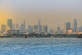 Chao Phraya river during sunset with high-rise condominium in bl Royalty Free Stock Photo