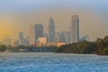 Chao Phraya river during sunset with high-rise condominium in bl Royalty Free Stock Photo