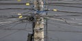 The chaos of cables and wires on an electric pole in Sao Paulo city, Brazil Royalty Free Stock Photo