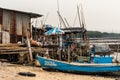 Chaotic boat scene at oyster beds during low tide in Ban Bai Bua, Thailand Royalty Free Stock Photo