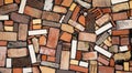 Chaotic bricks wall background, abstract industrial texture