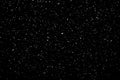 Chaotic white star bokeh on a isolated black background. falling blurry bokeh snow overlay, starry sky. white spots on black Royalty Free Stock Photo