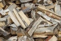 Chaotically scattered birch wood in a pile