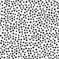 Chaotically scattered small round spots. Seamless pattern.