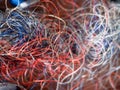 Chaotically tangled threads. Embroidery threads randomly woven. Huge knot. Extreme macro. Beautiful story for intro. Title credits
