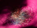 Chaotically tangled threads. Embroidery threads randomly woven. Huge knot. Extreme macro. Beautiful story for intro. Title credits