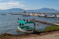 Chapala, Jalisco / Mexico, January 20th, 2020. Boat with Mexican flags moored on the shore of the lake