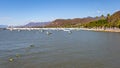 Chapala, Jalisco / Mexico, January 20th, 2020. Lake Chapala bay with calm waters with boats, its pier and promenade