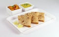 Chapati Indian Flat Bread with Dal and Chana Dal Masala as Side Dishes