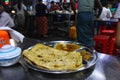 Chapati with curries at a roadside stand in Mandalay