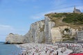 Beach and Chapel atop chalk Cliffs of Etretat, Normandy, France