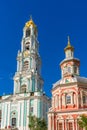 Chapel and Bell tower of Holy-Trinity St. Sergius Lavra against blue sky. Sergiyev Posad, Moscow region, Golden ring of Russia. Royalty Free Stock Photo