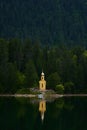 chapel built in a wooded area on the lake