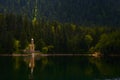 chapel built in a wooded area on the lake