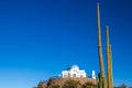 Chapel And Cross On Hill Next To Large Saguaro Cactus