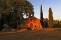 Chapel Saint Denis in the glow of evening sun light Bagnols-en-foret