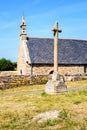 The chapel of Saint-Nicolas in Bugueles, Brittany, France, with its calvary on a sunny summer day