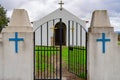 chapel sra das Neves with iron gate.2 blue crucifixes on the side pillars. Castelo Branco District