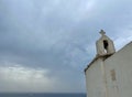 Chapel St. Roch in Bonfacio, Corsica, overlooking the sea in stormy weather.