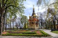 Gomel Palace and Park Ensemble. View of the chapel-tomb of the Paskevich family. Blooming flower beds of tulips near the tomb Royalty Free Stock Photo