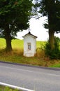 Chapel between two old big lindens trees