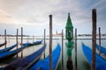 Chapel in water with moving gondolas in Venice Royalty Free Stock Photo