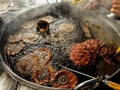 Chapli kebab is a popular street food in Pakistan. Making of chapli kabab at local food restaurant