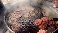 Chapli kebab is a popular street food in Pakistan. Making of chapli kabab at local food restaurant