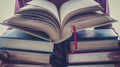 Chapter of Love, Heart Shaped Stack of Textbooks Holding an Open Love Story. Generative Ai