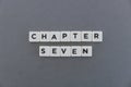 Chapter seven word made of square letter word on grey background