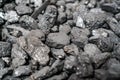 Char-coal. Pattern, heap. Pile of Bituminous Coal cinder. Stone coal Industry, business. Black coal mine close-up with soft focus Royalty Free Stock Photo