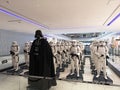 Character display of Darth Vader from the movie Star wars with an army of Stormtroopers figures in back