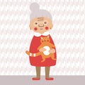 Character grandmother holds a cat.